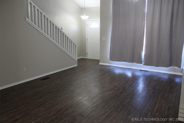 interior space featuring dark hardwood / wood-style flooring