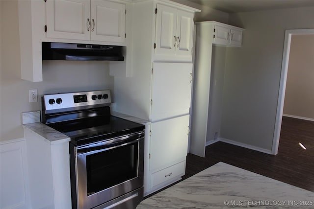 kitchen with white cabinetry, stainless steel range with electric stovetop, dark hardwood / wood-style flooring, and extractor fan