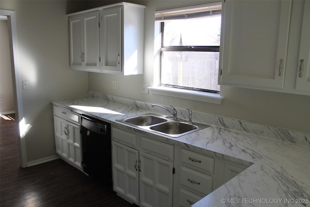 kitchen with sink, dishwasher, dark hardwood / wood-style floors, light stone counters, and white cabinets