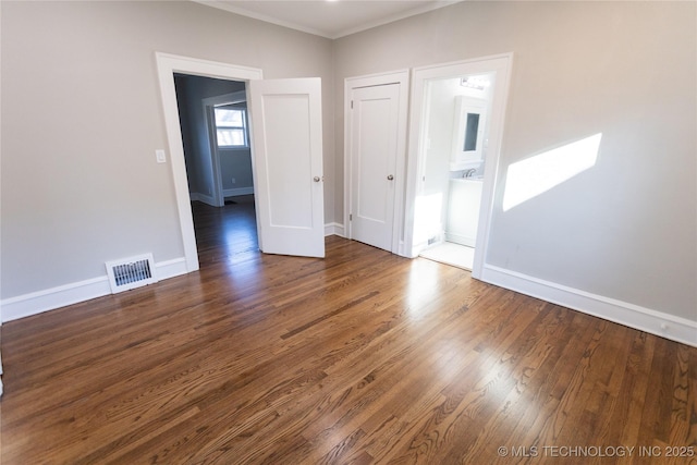 unfurnished room with dark hardwood / wood-style floors