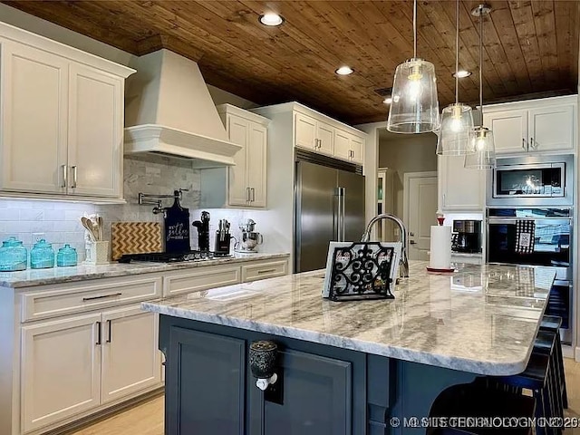 kitchen featuring built in appliances, premium range hood, and wood ceiling