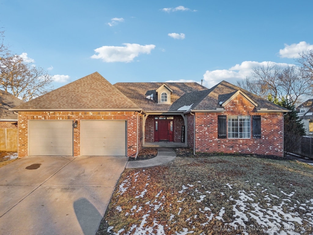 view of front of property featuring a garage