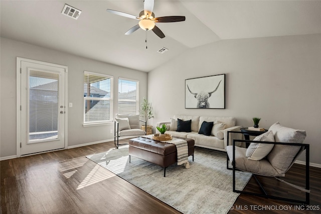 living room featuring vaulted ceiling, ceiling fan, and hardwood / wood-style floors