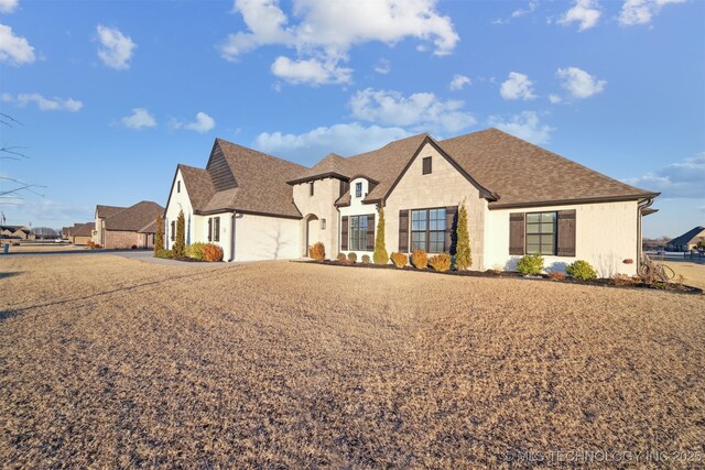 view of french country style house