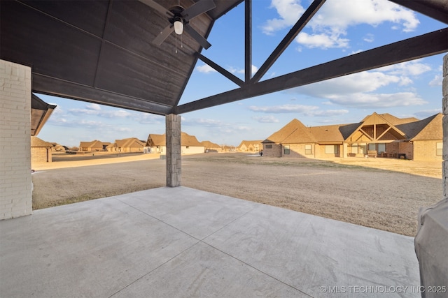view of patio featuring a residential view and ceiling fan