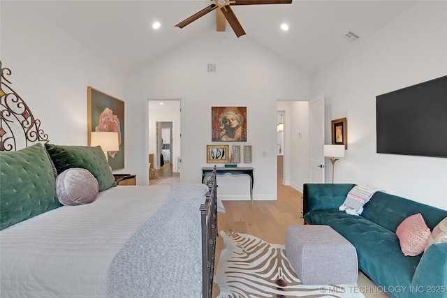 bedroom featuring high vaulted ceiling, ceiling fan, and light wood-type flooring