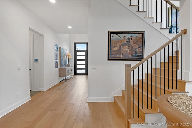 foyer with light hardwood / wood-style floors