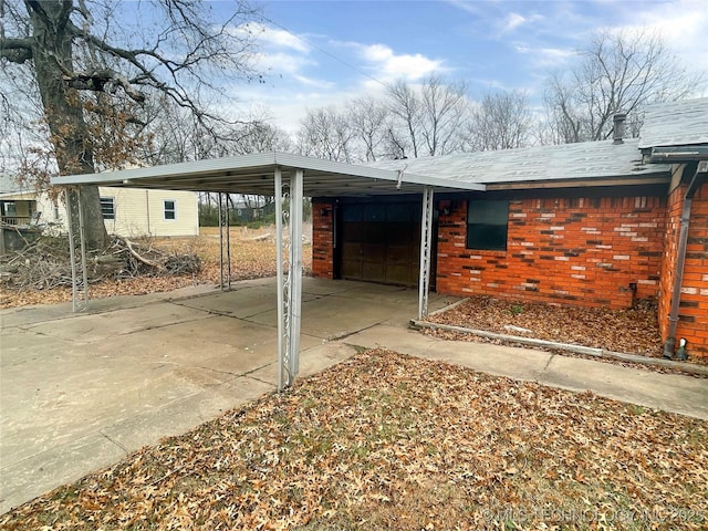 exterior space featuring a carport