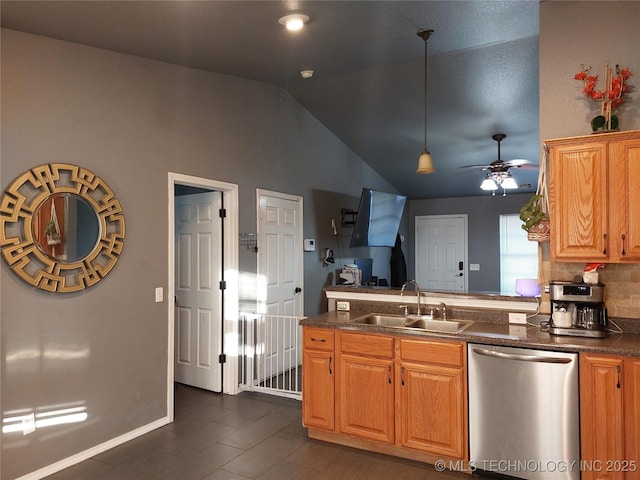 kitchen featuring stainless steel dishwasher, ceiling fan, sink, pendant lighting, and lofted ceiling