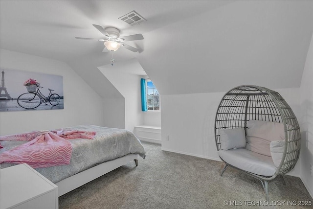 bedroom featuring ceiling fan, vaulted ceiling, and carpet floors