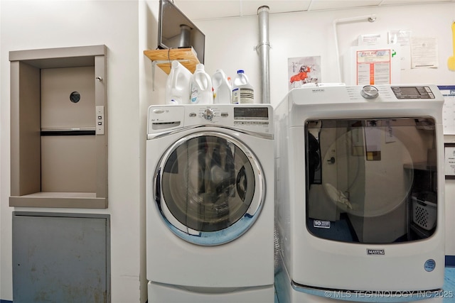 laundry room featuring washer and dryer