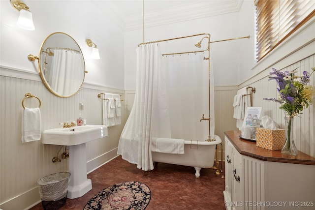 bathroom featuring shower / bathtub combination with curtain and crown molding