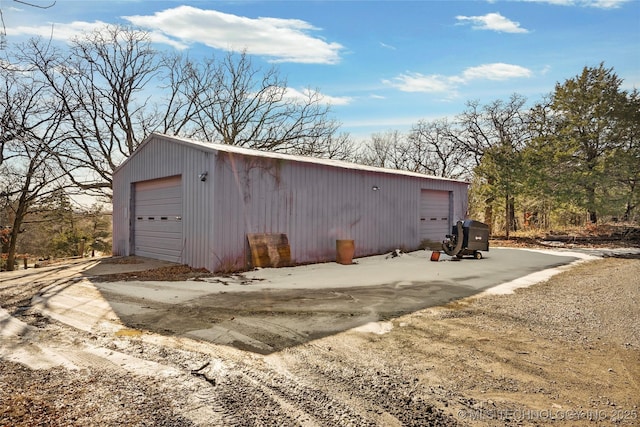 view of outbuilding featuring a garage