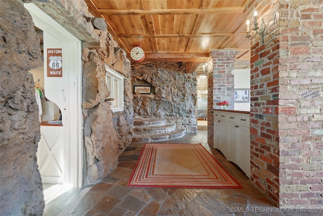 bathroom with wooden ceiling