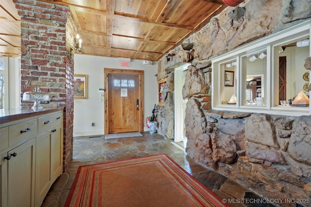 foyer featuring wooden ceiling