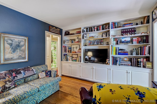 living room with light hardwood / wood-style flooring