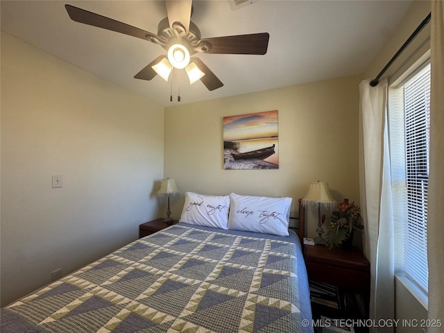 bedroom featuring ceiling fan