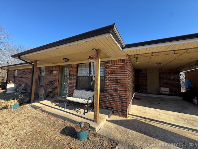 exterior space with a carport