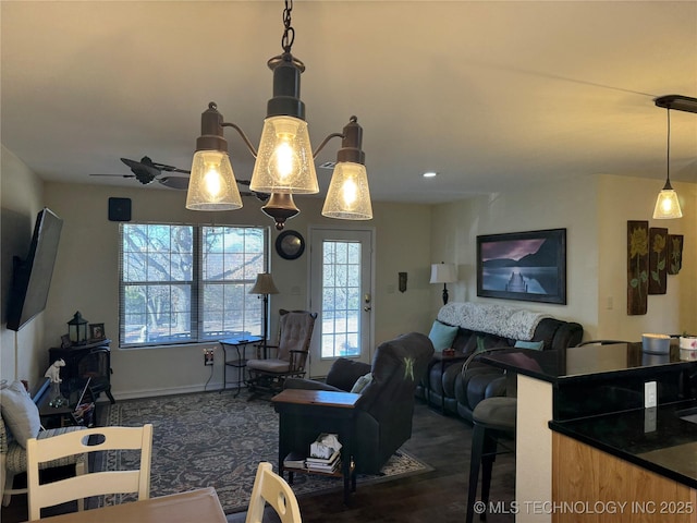 living room featuring ceiling fan