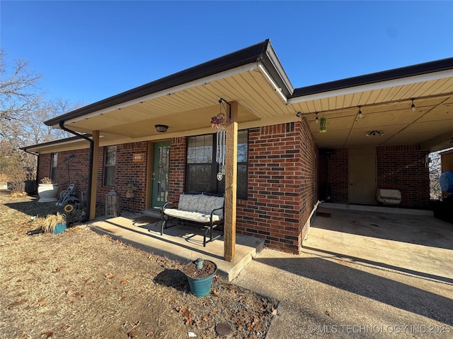 exterior space with a carport