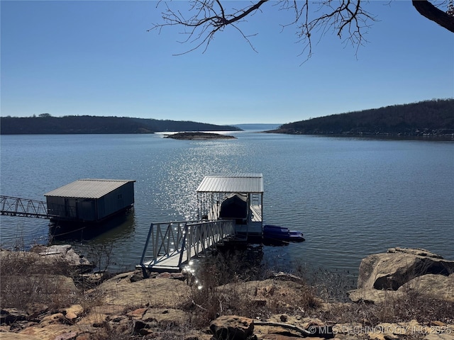 view of dock featuring a water view