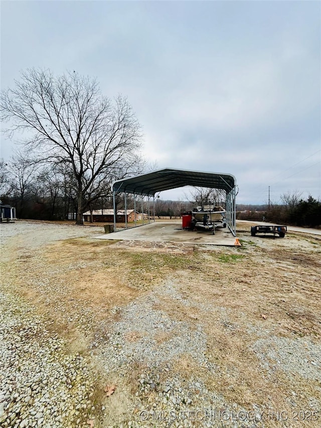 exterior space featuring a carport