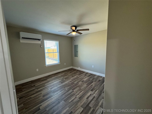 unfurnished room with ceiling fan, electric panel, dark wood-type flooring, and a wall unit AC