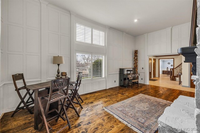 dining area featuring dark hardwood / wood-style flooring