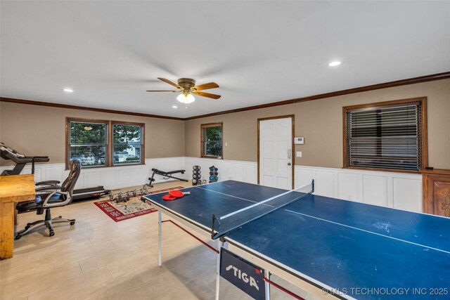 rec room featuring ornamental molding and ceiling fan