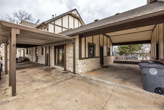 view of patio featuring a carport