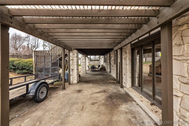 view of patio / terrace with an outbuilding