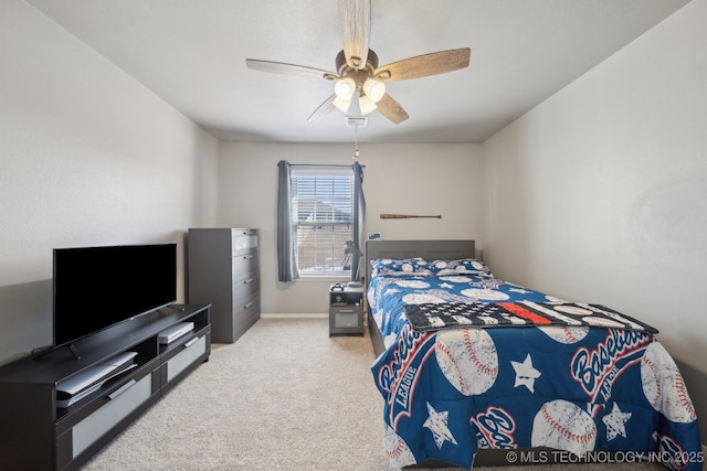 bedroom featuring ceiling fan and light colored carpet