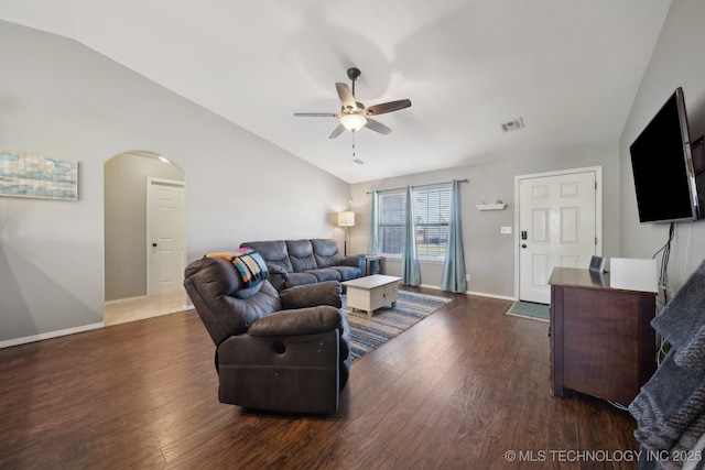 living room with ceiling fan, dark hardwood / wood-style flooring, and lofted ceiling