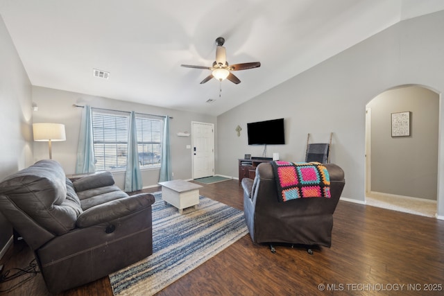 living room with vaulted ceiling, ceiling fan, and dark hardwood / wood-style floors