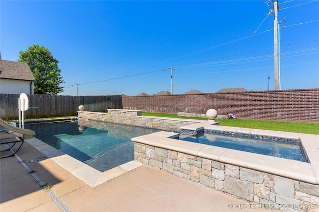 view of swimming pool featuring an in ground hot tub