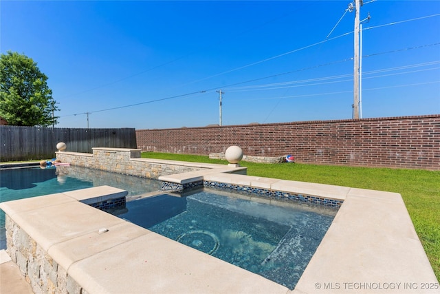 view of pool with an in ground hot tub