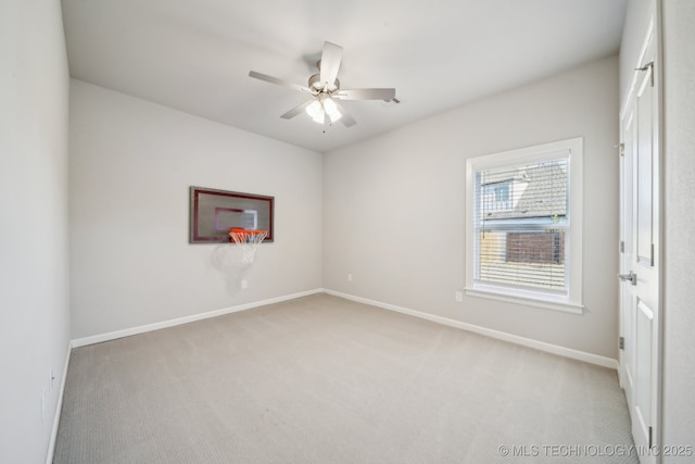 carpeted empty room with ceiling fan