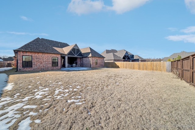 back of property with a patio area