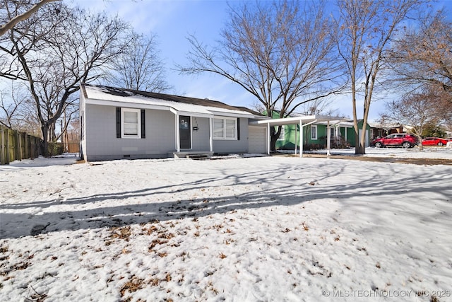 view of front of property featuring a carport