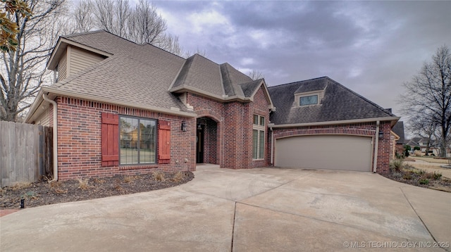 view of front of property with a garage