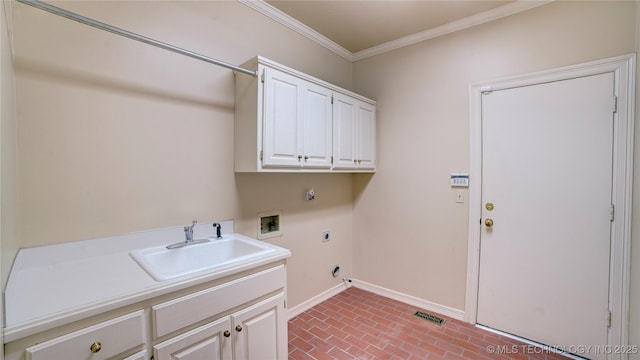 laundry room featuring sink, washer hookup, electric dryer hookup, cabinets, and ornamental molding