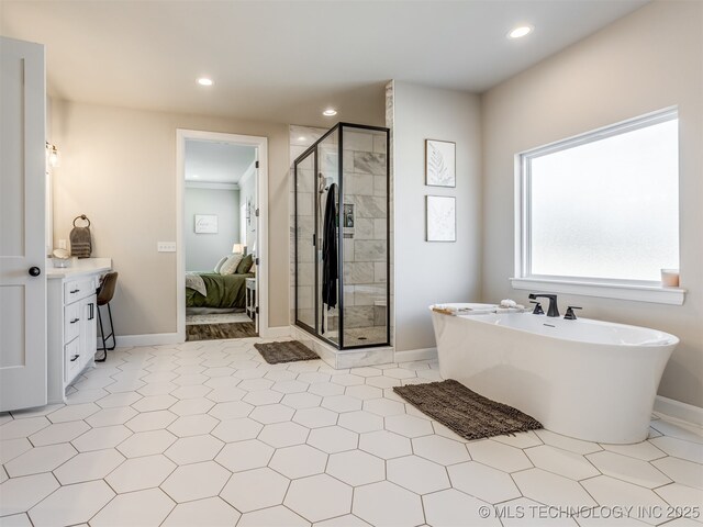 bathroom featuring plus walk in shower and vanity