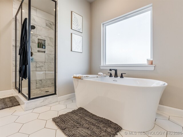 bathroom featuring separate shower and tub