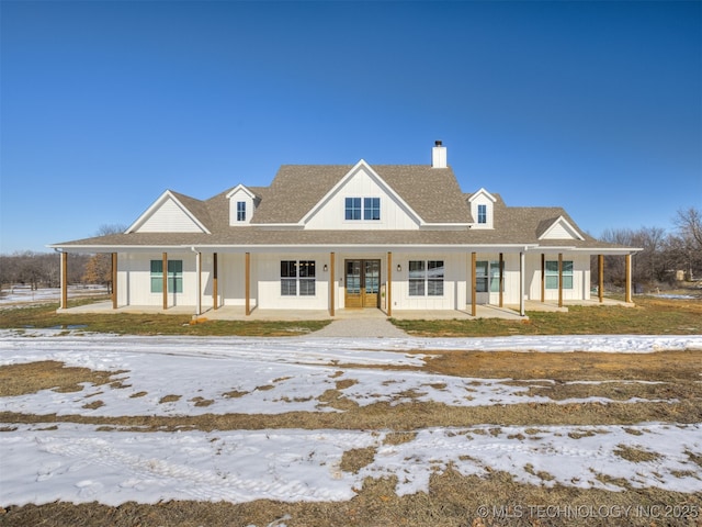 country-style home with covered porch