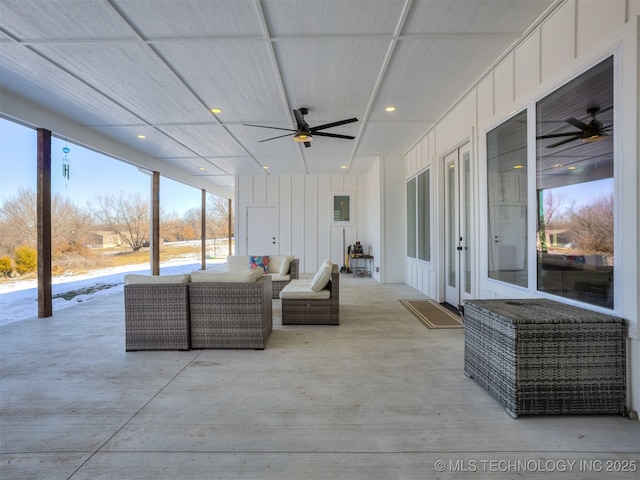 view of patio with ceiling fan and an outdoor hangout area