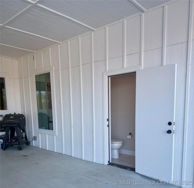 entrance to property featuring a patio