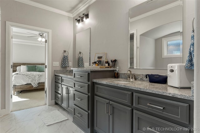 bathroom with vanity, ceiling fan, and crown molding