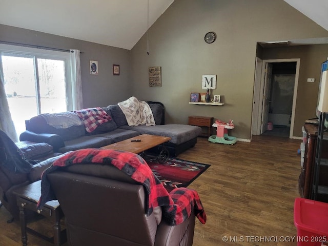 living room with dark wood-type flooring and lofted ceiling