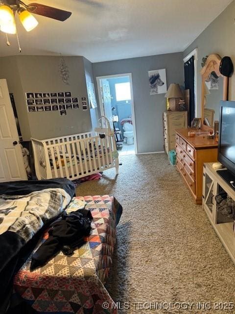 carpeted bedroom with ceiling fan