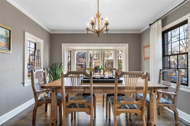 dining room featuring a notable chandelier, crown molding, and dark hardwood / wood-style floors